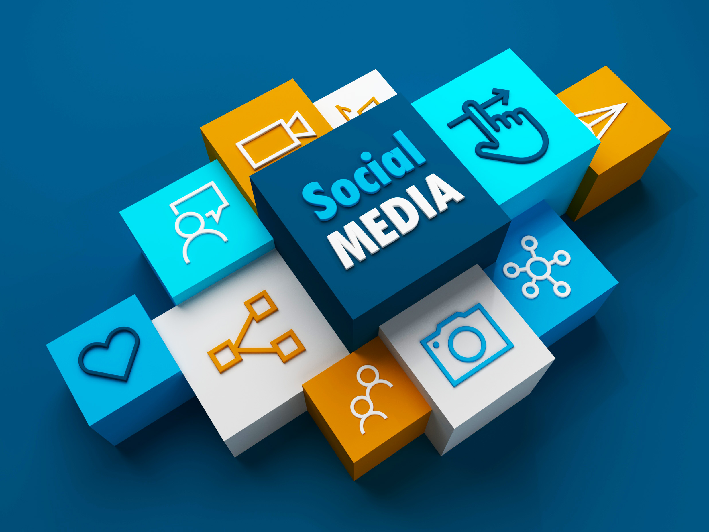 SOCIAL MEDIA business concept with symbols on colorful cubes